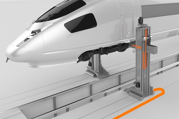 Plateforme élévatrice pour trains avec chaînes porte-câbles et câbles chainflex